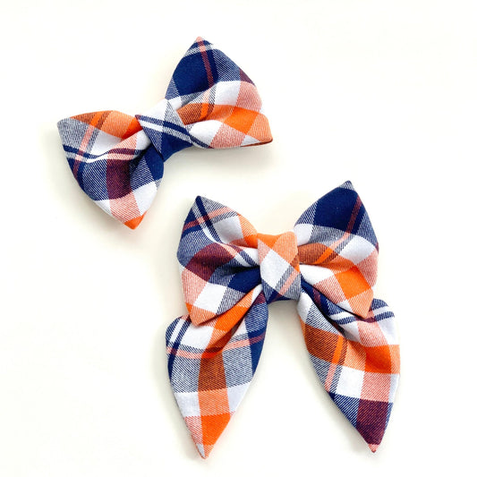 Pet bowtie in orange and blue in plaid pattern